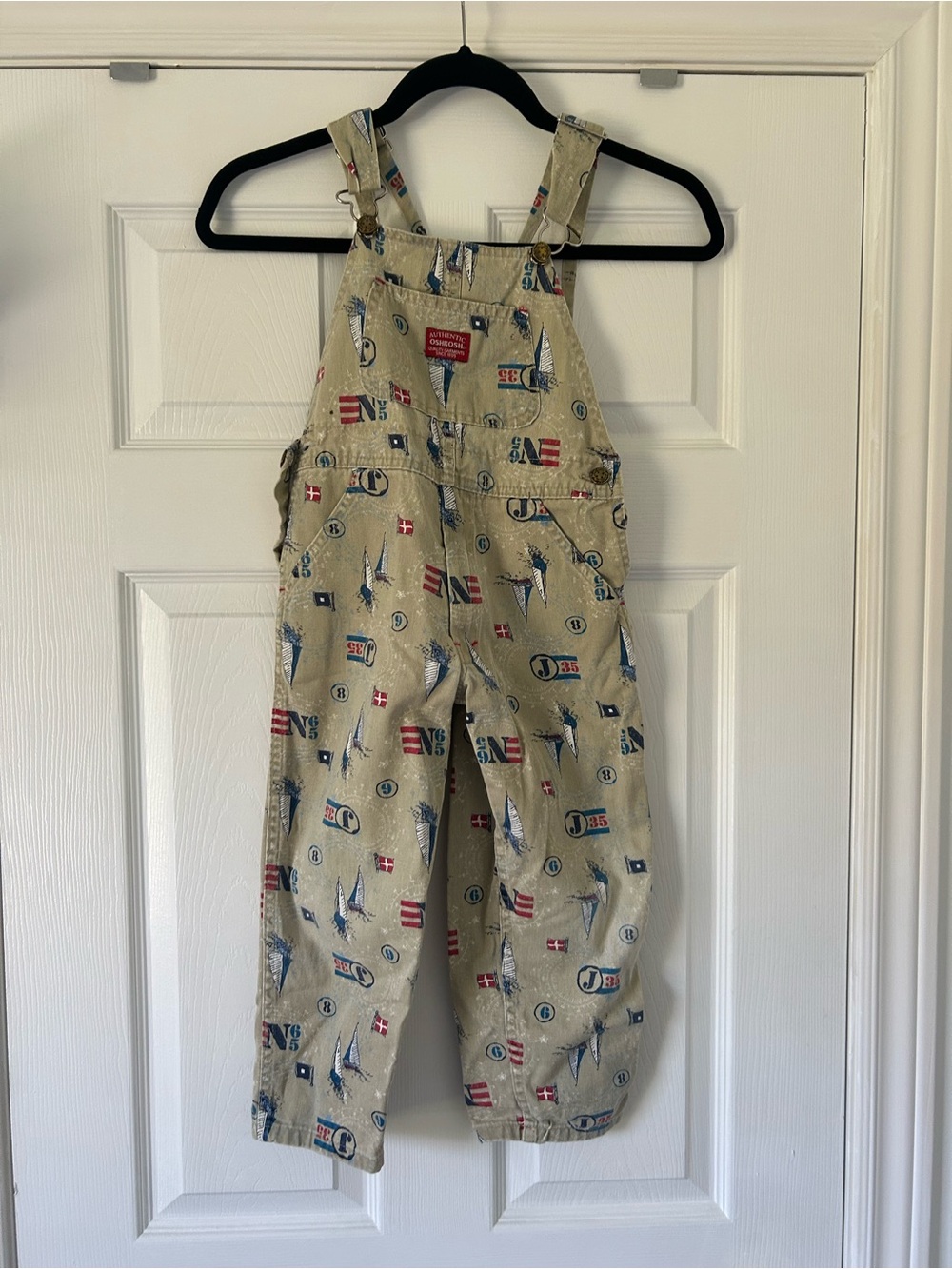 Vintage OshKosh B'gosh Tan Overalls with Blue and Red Sailboat Prints
